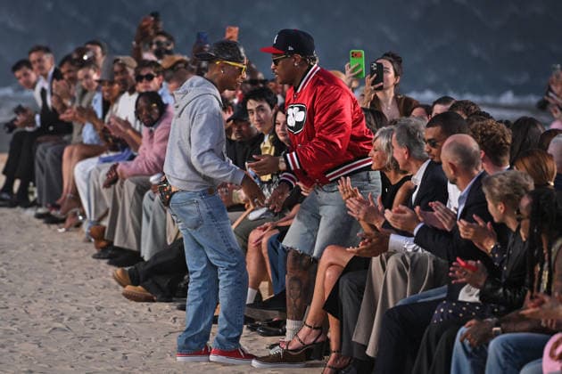 PFW - Louis Vuitton Runway in Paris FA US designer Pharrell Williams cheers the attendees at the end of the Spring Summer 2027 runway for his collection for Louis Vuitton during the Paris Fashion Week, on June 23, 2026. Photo by Firas Abdullah ABACAPRESS.COM Paris Ile-de-France France  Copyright: xAbdullahxFiras ABACAx