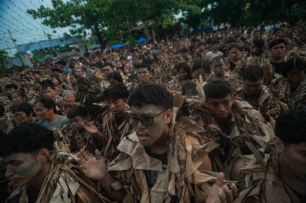 June 24, 2026, Aliaga, Nueva Ecija, Philippines: On June 24, 2026, local devotees of Saint John in the town of Bibiclat, Aliaga in Nueva Ecija, Philippines spread mud on their body and wear dried banana leaves in celeration of the Taong Putik Festival. The festival commemorates their local patron saint and the miracle that happened during the Japanese occupation that saved the locals from execution. Aliaga Philippines  - ZUMAy102 20260624_zip_y102_005 Copyright: xKenosisxYapx
