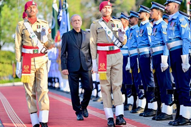 June 23, 2026, Peshawar, Peshawar, Pakistan: Iranian President Masoud Pezeshkian Reviews Honor Guard During Welcome Ceremony in Islamabad..Islamabad, Pakistan, June 23, 2026: Masoud Pezeshkian reviews an honor guard during an official welcome ceremony in Islamabad on June 23, 2026. Pezeshkian is in Pakistan to participate in ongoing diplomatic discussions and U.S.-Iran peace talks hosted by Pakistan. The visit underscores efforts to promote regional dialogue, diplomatic engagement, and international cooperation. Peshawar Pakistan - ZUMAa217 20260623_znp_a217_032 Copyright: xHussainxAlix