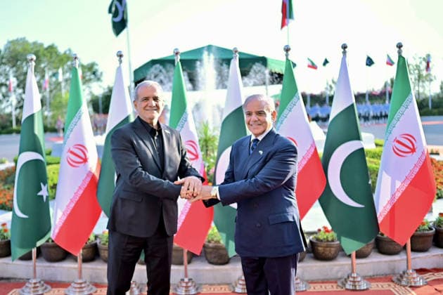 June 23, 2026, Peshawar, Peshawar, Pakistan: Iranian President Masoud Pezeshkian Reviews Honor Guard During Welcome Ceremony in Islamabad..Islamabad, Pakistan, June 23, 2026: Masoud Pezeshkian reviews an honor guard during an official welcome ceremony in Islamabad on June 23, 2026. Pezeshkian is in Pakistan to participate in ongoing diplomatic discussions and U.S.-Iran peace talks hosted by Pakistan. The visit underscores efforts to promote regional dialogue, diplomatic engagement, and international cooperation. Peshawar Pakistan - ZUMAa217 20260623_znp_a217_034 Copyright: xHussainxAlix