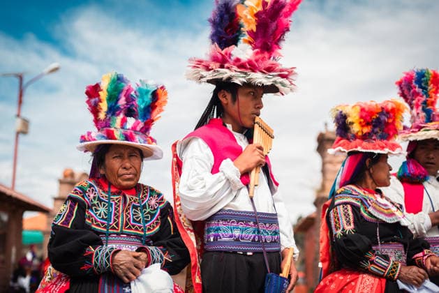 Residents of Taquile Island in their traditional costumes. Puno, Puno, Peru CR_GUCA260618-2056786-01 EDITORIAL USE ONLY