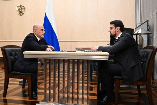 RUSSIA, MOSCOW - JUNE 24, 2026: Russia s Prime Minister Mikhail Mishustin (L) meets with Far East and Arctic Development Corporation CEO Nikolai Zapryagayev at the House of the Russian Government. Alexander Miridonov POOL TASS  94207397