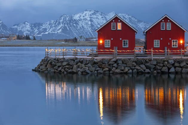 Creative Highlights World #2 Typical red rorbuer cabins in Lofoten, Norway Flakstad, Nordland, Norway CR_UTCI2606236F-2059615-01