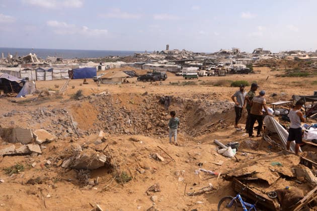 Displaced Palestinians inspect damaged tents after strike in Gaza City Displaced Palestinians inspect their heavily damaged tents near a displacement camp in the Sheikh Ajlin neighborhood, west of Gaza City, on June 24, 2026. An Israeli military strike overnight hit the coastal area where thousands of displaced families have sought shelter, leaving a large crater and causing extensive damage to displacement tents despite a ceasefire agreement being in force. Photo by Belal Osama apaimages Gaza Gaza Strip Palestinian Territory 240626_Gaza_BO_00(9) Copyright: xapaimagesxBelalxOsamax xapaimagesx
