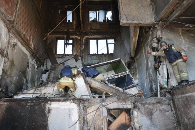 RUSSIA, GORLOVKA - JUNE 24, 2026: First responders of the Russian Emergencies Ministry work in an apartment block destroyed in a drone attack. Dmitry Yagodkin TASS  94215175