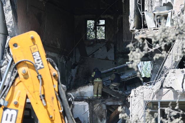 RUSSIA, GORLOVKA - JUNE 24, 2026: First responders of the Russian Emergencies Ministry work in an apartment block destroyed in a drone attack. Dmitry Yagodkin TASS  94215102