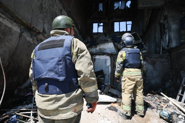 RUSSIA, GORLOVKA - JUNE 24, 2026: First responders of the Russian Emergencies Ministry work in an apartment block destroyed in a drone attack. Dmitry Yagodkin TASS  94215172