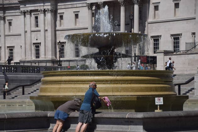 June 24, 2026, London, England, United Kingdom: People cool down in a fountain in Trafalgar Square as the Met Office issues an amber warning for extreme heat. London United Kingdom - ZUMAv130 20260624_zip_v130_008 Copyright: xVukxValcicx