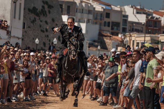 June 24, 2026, Ciutadella, Menorca Balearic Islands, Spain: A caixer (horse rider) aims his lance at a suspended ring during the training session for the Jocs des Pla (medieval tournament) during the traditional Sant Joan (Saint John) festival in Ciutadella de Menorca Ciutadella Spain  - ZUMAo105 20260624_fap_o105_001 Copyright: xMatthiasxOesterlex