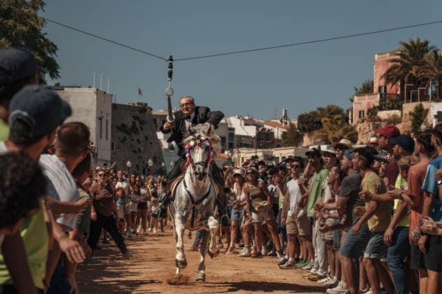 June 24, 2026, Ciutadella, Menorca Balearic Islands, Spain: A caixer (horse rider) aims his lance at a suspended ring during the training session for the Jocs des Pla (medieval tournament) during the traditional Sant Joan (Saint John) festival in Ciutadella de Menorca Ciutadella Spain - ZUMAo105 20260624_fap_o105_005 Copyright: xMatthiasxOesterlex