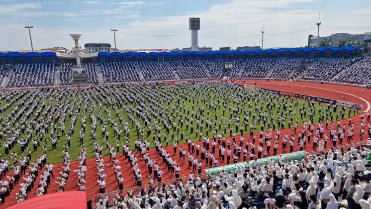 Traditional Andijan Polka dance performance enters Guinness World Records in Uzbekistan ANDIJAN, UZBEKISTAN - JUNE 24: Hundreds of performers dressed in traditional attire fill the entire field and running tracks of a stadium to perform the iconic national folk dance, Andijan polka, simultaneously in Andijan, Uzbekistan on June 24, 2026. The mass synchronized cultural event, which saw the participation of approximately 500 people, successfully entered the Guinness World Records. Bahtiyar Abdülkerimov Anadolu Andijan Uzbekistan. Editorial use only. Please get in touch for any other usage.  Copyright: x2026xAnadoluxBahtiyarxAbdülkerimovx