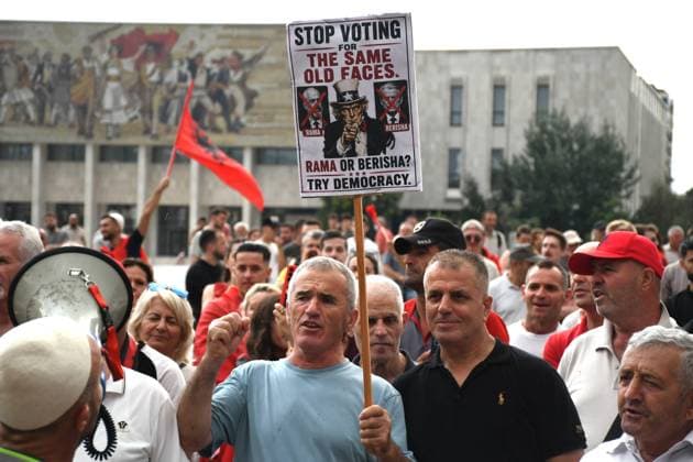 Demonstrations over controversial Vlora tourism project enter 25th day in Tirana TIRANA, ALBANIA - JUNE 24: Protesters gather at Skanderbeg Square despite the rain on the 25th day of demonstrations against a planned tourism development project in the Zvernec region of Vlora, holding banners with the slogan Albania is not for sale in Tirana, Albania on June 24, 2026. Olsi Shehu Anadolu Tirana World. Editorial use only. Please get in touch for any other usage.  Copyright: x2026xAnadoluxOlsixShehux