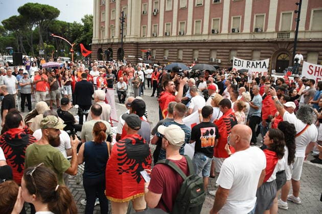 Demonstrations over controversial Vlora tourism project enter 25th day in Tirana TIRANA, ALBANIA - JUNE 24: Protesters gather at Skanderbeg Square despite the rain on the 25th day of demonstrations against a planned tourism development project in the Zvernec region of Vlora, holding banners with the slogan Albania is not for sale in Tirana, Albania on June 24, 2026. Olsi Shehu Anadolu Tirana World. Editorial use only. Please get in touch for any other usage.  Copyright: x2026xAnadoluxOlsixShehux
