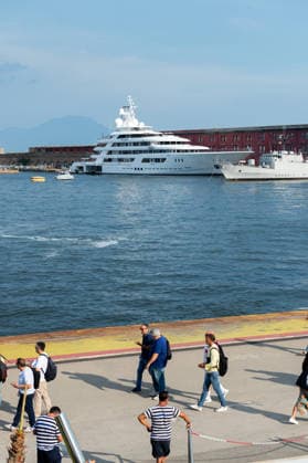 Superyacht Boardwalk moored in the port of Naples NAPLES, ITALY - JUNE 24: Superyacht Boardwalk of U.S. Ambassador to Italy Tilman Fertitta is moored in the port of Naples, Italy, on June 24, 2026. Tilman Fertitta reportedly expressed his intention to anchor near St. Mark’s Basin during the Redentore celebrations in Venice, sparking protests from environmental groups and civic organizations. While waiting to see what the Venetian authorities’ final decision will be, Fertitta has chosen Naples as his base. Eliano Imperato Anadolu Naples Italy. Editorial use only. Please get in touch for any other usage.  Copyright: x2026xAnadoluxElianoxImperatox
