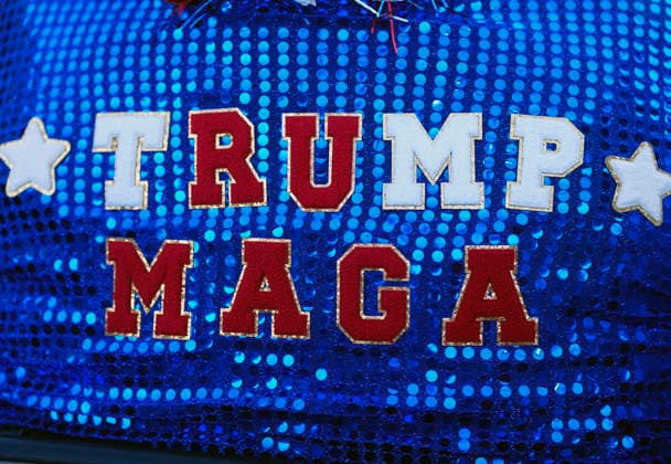 Attendees wearTrump MAGA themed cloths before President Donald Trump speaks at a rally to kick off the 16-day Great American State Fair as part of Washington, D.C. s celebration of the nation s 250th birthday on the National Mall on Wednesday, June 24, 2026. The rally will include military flyovers, musical performances from Lee Greenwood and Christopher Macchio, and the U.S. Army Band, the U.S. Marine Band and Armed Forces choirs.  WAP20260624344 BONNIExCASH