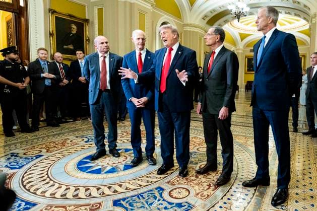 June 24, 2026, Washington, District Of Columbia, USA: U.S. President DONALD TRUMP, hands out speaking and gesturing with American U.S. Senators MIKE LEE (R-UT), RICK SCOTT (R-FL), and JOHN BARRASSO (R-WY), as they talk to reporters at the U.S. Capitol. Trump cancels bipartisan housing bill signing, reiterates demand for SAVE America Act. Washington USA - ZUMAb161 20260624_aap_b161_007 Copyright: xMichaelxBrochsteinx