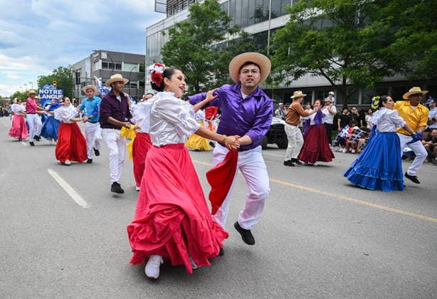 June 24, 2026, Montreal, Pq, Canada: Dancers entertain the crowd during the Saint-Jean-Baptiste Day parade in Montreal, on Wednesday, June 24, 2026. Montreal Canada  - ZUMAc35_ 20260624_zaf_c35_177 Copyright: xGrahamxHughesx