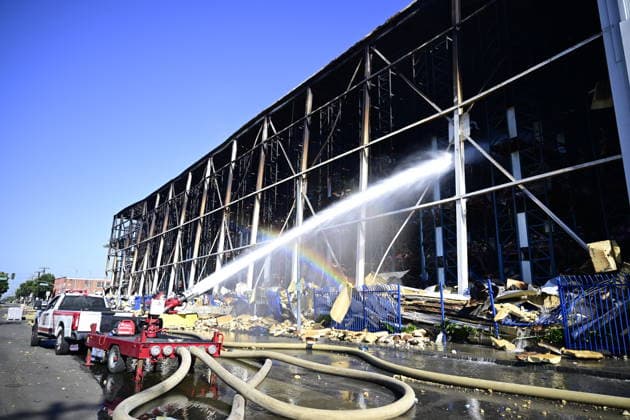 Lineage Warehouse Fire Day 8 Burned storage racks and debris are visible as firefighters continue to battle the Lineage cold storage warehouse fire in Boyle Heights, Los Angeles, on June 24, 2026. Officials said the city remains under a state of emergency after the June 17 blaze broke out in a 500,000-square-foot frozen food facility. Firefighters have faced difficult conditions including burning insulation, suspected ammonia leaks, and damaged solar panel systems, which have complicated suppression efforts at the site. Los Angeles United States Copyright: xWestonxHancockx xSOPAxImagesx Weston Hancock June 24 - 1951