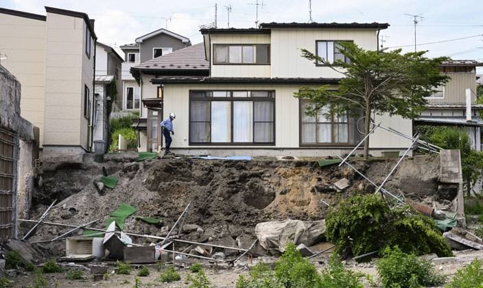 Powerful earthquake hits northeastern Japan A retaining wall is seen collapsed in Hachinohe in Aomori Prefecture on June 25, 2026, after a preliminary magnitude-7.2 earthquake hit northeastern Japan.  A14AA0005620168P