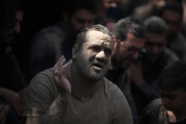 Mourners commemorate Karbala martyrs on Ashura in Iran??????? TEHRAN, IRAN - JUNE 25: Members of the Lur ethnic community take part in the traditional Gil-mali (mud-smearing) ritual during Ashura commemorations at Osshaghol Abbas Hosseiniyeh in Tehran, Iran, on June 25, 2026. Marking the anniversary of the martyrdom of Imam Hussein, the grandson of Prophet Muhammad, and his 72 companions in Karbala, participants covered themselves in mud as a sign of mourning and remembrance. Fatemeh Bahrami Anadolu Tehran Iran. Editorial use only. Please get in touch for any other usage.  Copyright: x2026xAnadoluxFatemehxBahramix