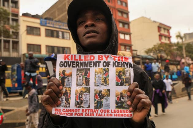 Demonstration held on the second anniversary of the deadly Generation Z protests in Kenya NAIROBI, KENYA - JUNE 25: A demonstrator holds a banner as a demonstration held on the second anniversary of the protests that erupted in 2024 against the controversial finance bill led by Generation Z and resulted in the deaths of dozens of people in Nairobi, Kenya, on June 25, 2026. Families of those who lost their lives, activists, and citizens gathered in front of the parliament building to commemorate the victims despite heavy police barricades and lockdown measures in the capital. Lucas Mukasa Anadolu Nairobi Kenya. Editorial use only. Please get in touch for any other usage.  Copyright: x2026xAnadoluxLucasxMukasax