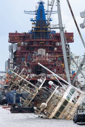 RUSSIA, ST PETERSBURG - JUNE 25, 2026: Salvage operations are underway for the Kapitan Ushakov tugboat at the Baltic Shipyard. The vessel partially sank on 8 August 2025, after listing to its starboard during construction work; no injuries reported. The damage was estimated by specialists from the North-Western Interregional Directorate of the Federal Service for Supervision of Natural Resources (Rosprirodnadzor) at 651 million rubles. Peter Kovalev TASS  94259105