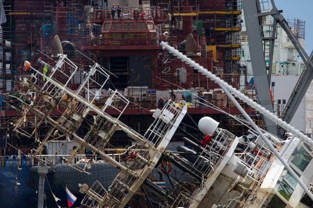RUSSIA, ST PETERSBURG - JUNE 25, 2026: Salvage operations are underway for the Kapitan Ushakov tugboat at the Baltic Shipyard. The vessel partially sank on 8 August 2025, after listing to its starboard during construction work; no injuries reported. The damage was estimated by specialists from the North-Western Interregional Directorate of the Federal Service for Supervision of Natural Resources (Rosprirodnadzor) at 651 million rubles. Peter Kovalev TASS  94260518