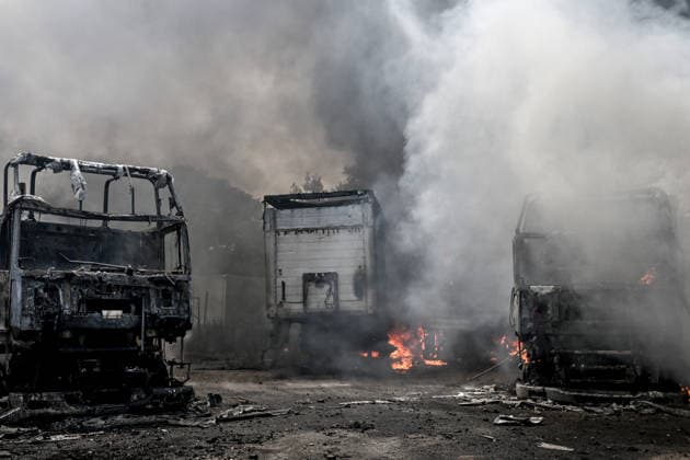 Trucks are engulfed by smoke from a fire at a parking lot, caused by Russian drone strikes, Zaporizhzhia, Ukraine, June 25, 2026. The Russian army attacked the city with strike drones, targeting a petrol station, Ukrzaliznytsia (Ukrainian Railways) locomotives and a parking lot. Fires broke out, and one person was killed as a result of the attack. (Photo by Dmytro Smolienko Ukrinform) Russia attacks parking lot in Zaporizhzhia with drones  Copyright: xDmytroxSmolienkox