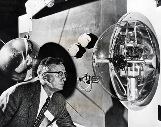 RECORD DATE NOT STATED Photograph of Dr. A. V. Austin Photograph of Dr. A. V. Austin, director of the National Bureau of Standards and member of the U.S. National Committee for the International Geophysical Year, studying a cut-away model of the earth satellite to be launched by the United States. Dated 20th century Editorial use only. All other uses to be cleared with the copyright owner (World History Archive), in advance., WHA_106_0202.jpg, Dr. A. V. Austin; National Bureau of Standards; U.S. National Committee; International Geophysical Year; earth satellite; United States; director; model; cut-away; study; launch; scientist; technology; research; space exploration; 20th century; American; engineer; satellite; space race; NASA; historic Copyright: xx