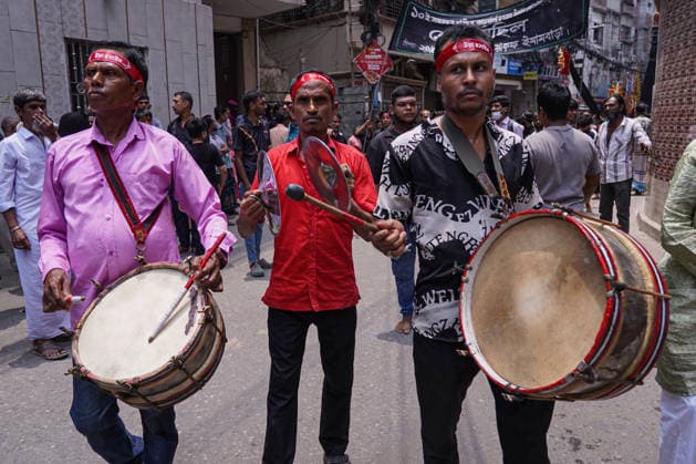 June 26, 2026, Dhaka, Dhaka, Bangladesh: Dhaka, June 26, 2026: Marking the 10th day of Muharram, the holy day of Ashura, members of the Shia Muslim community observed the occasion with Tazia processions, matam (ritual mourning), and other religious ceremonies in remembrance of the martyrdom of Imam Hussain, the grandson of Prophet Muhammad, at the Battle of Karbala. The mourning procession began at the historic Hussaini Dalan in Old Dhaka and concluded at Zigatola. As part of the observance, some devotees donated chickens and pigeons as acts of charity and devotion. People from different communities gathered along both sides of the roads to watch the Ashura procession, reflecting the day s profound religious and cultural significance. Dhak - ZUMAk185 20260626_zip_k185_011 Copyright: xRubelxKarmakerx