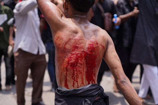 June 26, 2026, Dhaka, Dhaka, Bangladesh: Dhaka, June 26, 2026: Marking the 10th day of Muharram, the holy day of Ashura, members of the Shia Muslim community observed the occasion with Tazia processions, matam (ritual mourning), and other religious ceremonies in remembrance of the martyrdom of Imam Hussain, the grandson of Prophet Muhammad, at the Battle of Karbala. The mourning procession began at the historic Hussaini Dalan in Old Dhaka and concluded at Zigatola. As part of the observance, some devotees donated chickens and pigeons as acts of charity and devotion. People from different communities gathered along both sides of the roads to watch the Ashura procession, reflecting the day s profound religious and cultural significance. Dhak - ZUMAk185 20260626_zip_k185_017 Copyright: xRubelxKarmakerx