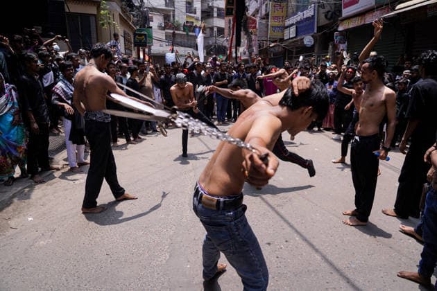 June 26, 2026, Dhaka, Dhaka, Bangladesh: Dhaka, June 26, 2026: Marking the 10th day of Muharram, the holy day of Ashura, members of the Shia Muslim community observed the occasion with Tazia processions, matam (ritual mourning), and other religious ceremonies in remembrance of the martyrdom of Imam Hussain, the grandson of Prophet Muhammad, at the Battle of Karbala. The mourning procession began at the historic Hussaini Dalan in Old Dhaka and concluded at Zigatola. As part of the observance, some devotees donated chickens and pigeons as acts of charity and devotion. People from different communities gathered along both sides of the roads to watch the Ashura procession, reflecting the day s profound religious and cultural significance. Dhak - ZUMAk185 20260626_zip_k185_019 Copyright: xRubelxKarmakerx