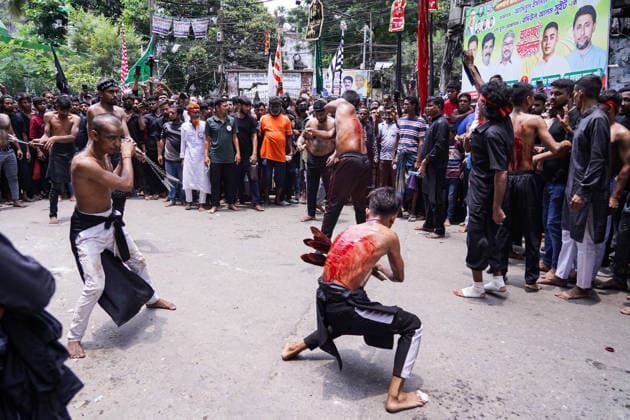 June 26, 2026, Dhaka, Dhaka, Bangladesh: Dhaka, June 26, 2026: Marking the 10th day of Muharram, the holy day of Ashura, members of the Shia Muslim community observed the occasion with Tazia processions, matam (ritual mourning), and other religious ceremonies in remembrance of the martyrdom of Imam Hussain, the grandson of Prophet Muhammad, at the Battle of Karbala. The mourning procession began at the historic Hussaini Dalan in Old Dhaka and concluded at Zigatola. As part of the observance, some devotees donated chickens and pigeons as acts of charity and devotion. People from different communities gathered along both sides of the roads to watch the Ashura procession, reflecting the day s profound religious and cultural significance. Dhak - ZUMAk185 20260626_zip_k185_021 Copyright: xRubelxKarmakerx