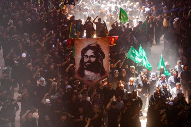 Muharram month events in Karbala KARBALA, IRAQ - JUNE 26: Thousands of mourners take part in Muharram commemorations during a mourning ceremony marking the martyrdom of Imam Hussein and his 72 companions, as participants from across Iraq and abroad join the Tuwairij run carrying flags on the 10th day of Muharram, on June 26, 2026, in Karbala, Iraq. Karar Essa Anadolu Karbala Iraq. Editorial use only. Please get in touch for any other usage.  Copyright: x2026xAnadoluxKararxEssax