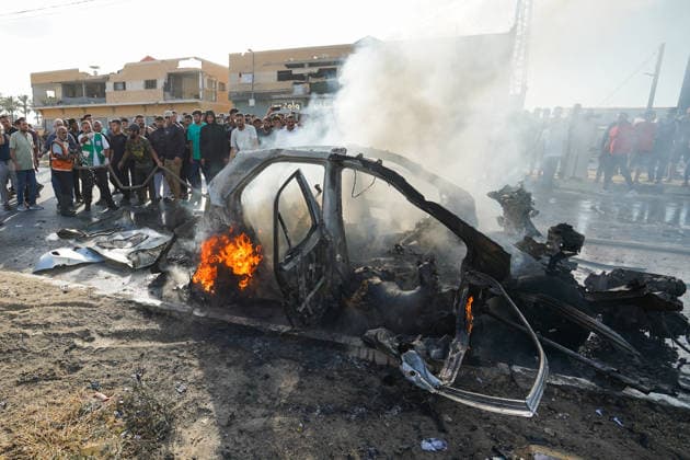 Israeli attacks continue on Gaza despite ceasefire GAZA CITY, GAZA, PALESTINE - JUNE 26: A view of a burned-out vehicle on Salah al-Din Street in central Gaza, Palestine following an Israeli strike on June 26, 2026. Three Palestinians were killed after Israeli forces targeted a civilian vehicle in an attack described as a violation of the ceasefire. The vehicle caught fire as a result of the strike, while medical, civil defense and firefighting teams were dispatched to the area. Adam Bilal Anadolu Gaza City Gaza. Editorial use only. Please get in touch for any other usage.  Copyright: x2026xAnadoluxAdamxBilalx