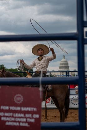 June 26, 2026, Washington, District Of Columbia, USA: A cowboy throws a lasso at a rodeo during the Great American State Fair on the National Mall in Washington, D.C. on June 26, 2026. Rodeo 250, produced by Cervi Rodeo Company, is one of numerous events during the 16-day fair, celebrating the 250th anniversary of the United States of America. Washington USA - ZUMAd227 20260626_znp_d227_018 Copyright: xBryanxDozierx