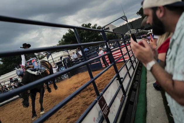 June 26, 2026, Washington, District Of Columbia, USA: People applaud as a cowboy rides a horse at a rodeo during the Great American State Fair on the National Mall in Washington, D.C. on June 26, 2026. Rodeo 250, produced by Cervi Rodeo Company, is one of numerous events during the 16-day fair, celebrating the 250th anniversary of the United States of America. Washington USA - ZUMAd227 20260626_znp_d227_035 Copyright: xBryanxDozierx