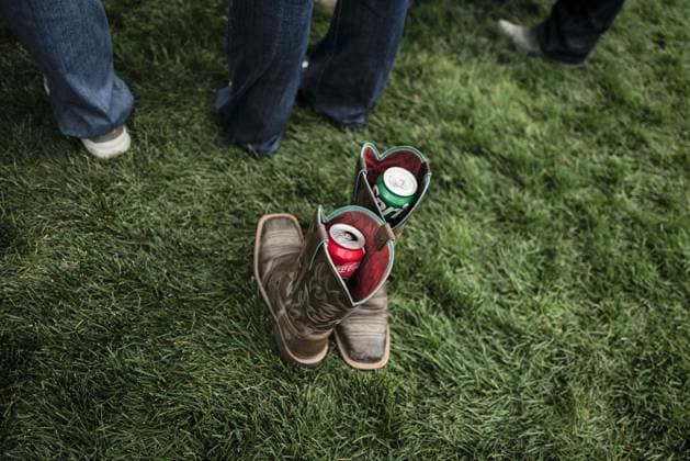 June 26, 2026, Washington, District Of Columbia, USA: Soda cans are seen placed inside of a pair of cowboy boots at a rodeo during the Great American State Fair on the National Mall in Washington, D.C. on June 26, 2026. Rodeo 250, produced by Cervi Rodeo Company, is one of numerous events during the 16-day fair, celebrating the 250th anniversary of the United States of America. Washington USA - ZUMAd227 20260626_znp_d227_042 Copyright: xBryanxDozierx