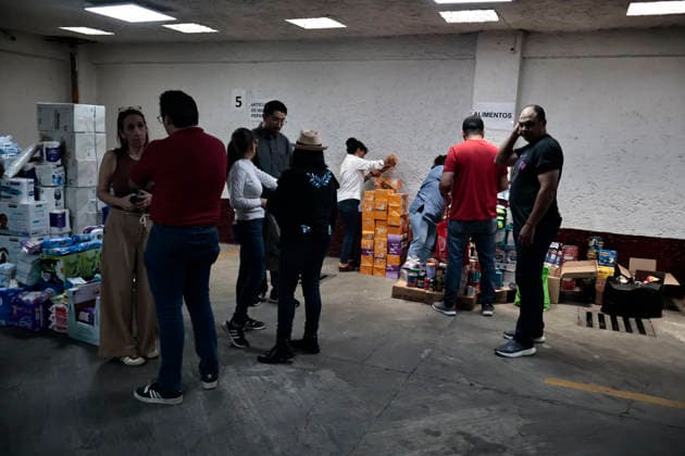 June 26, 2026, Mexico City, Cdmx, Mexico: In response to earthquakes that have caused material losses and casualties in Venezuela, the country s embassy in Mexico City opened its doors as a collection center. It is accepting humanitarian aid brought by Mexicans, foreign nationals, and Venezuelans living in Mexico to provide support during this time. On the first day of accepting itemsâ€including medicines, non-perishable food, water, and hygiene productsâ€dozens of Venezuelans working as app-based delivery drivers arrived at the embassy. Carrying flags and singing their national anthem, they brought supplies needed by their relatives and fellow citizens. Many stated that while their people endure this crisis caused by natural di - ZUMAp204 20260626_zip_p204_001 Copyright: xJosuexPerezx