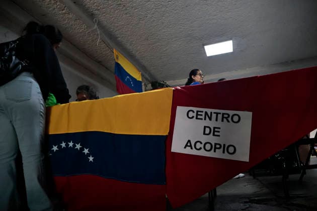 June 26, 2026, Mexico City, Cdmx, Mexico: In response to earthquakes that have caused material losses and casualties in Venezuela, the country s embassy in Mexico City opened its doors as a collection center. It is accepting humanitarian aid brought by Mexicans, foreign nationals, and Venezuelans living in Mexico to provide support during this time. On the first day of accepting itemsâ€including medicines, non-perishable food, water, and hygiene productsâ€dozens of Venezuelans working as app-based delivery drivers arrived at the embassy. Carrying flags and singing their national anthem, they brought supplies needed by their relatives and fellow citizens. Many stated that while their people endure this crisis caused by natural di - ZUMAp204 20260626_zip_p204_002 Copyright: xJosuexPerezx