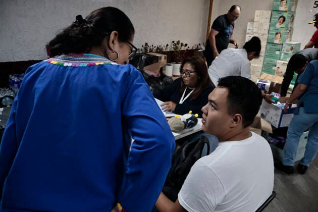 June 26, 2026, Mexico City, Cdmx, Mexico: In response to earthquakes that have caused material losses and casualties in Venezuela, the country s embassy in Mexico City opened its doors as a collection center. It is accepting humanitarian aid brought by Mexicans, foreign nationals, and Venezuelans living in Mexico to provide support during this time. On the first day of accepting itemsâ€including medicines, non-perishable food, water, and hygiene productsâ€dozens of Venezuelans working as app-based delivery drivers arrived at the embassy. Carrying flags and singing their national anthem, they brought supplies needed by their relatives and fellow citizens. Many stated that while their people endure this crisis caused by natural di - ZUMAp204 20260626_zip_p204_008 Copyright: xJosuexPerezx