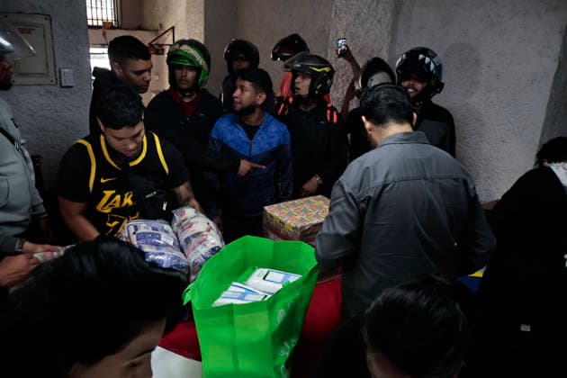 June 26, 2026, Mexico City, Cdmx, Mexico: In response to earthquakes that have caused material losses and casualties in Venezuela, the country s embassy in Mexico City opened its doors as a collection center. It is accepting humanitarian aid brought by Mexicans, foreign nationals, and Venezuelans living in Mexico to provide support during this time. On the first day of accepting itemsâ€including medicines, non-perishable food, water, and hygiene productsâ€dozens of Venezuelans working as app-based delivery drivers arrived at the embassy. Carrying flags and singing their national anthem, they brought supplies needed by their relatives and fellow citizens. Many stated that while their people endure this crisis caused by natural di - ZUMAp204 20260626_zip_p204_037 Copyright: xJosuexPerezx