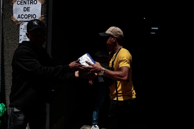 June 26, 2026, Mexico City, Cdmx, Mexico: In response to earthquakes that have caused material losses and casualties in Venezuela, the country s embassy in Mexico City opened its doors as a collection center. It is accepting humanitarian aid brought by Mexicans, foreign nationals, and Venezuelans living in Mexico to provide support during this time. On the first day of accepting itemsâ€including medicines, non-perishable food, water, and hygiene productsâ€dozens of Venezuelans working as app-based delivery drivers arrived at the embassy. Carrying flags and singing their national anthem, they brought supplies needed by their relatives and fellow citizens. Many stated that while their people endure this crisis caused by natural di - ZUMAp204 20260626_zip_p204_057 Copyright: xJosuexPerezx