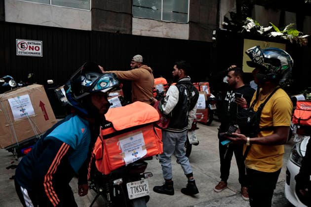 June 26, 2026, Mexico City, Cdmx, Mexico: In response to earthquakes that have caused material losses and casualties in Venezuela, the country s embassy in Mexico City opened its doors as a collection center. It is accepting humanitarian aid brought by Mexicans, foreign nationals, and Venezuelans living in Mexico to provide support during this time. On the first day of accepting itemsâ€including medicines, non-perishable food, water, and hygiene productsâ€dozens of Venezuelans working as app-based delivery drivers arrived at the embassy. Carrying flags and singing their national anthem, they brought supplies needed by their relatives and fellow citizens. Many stated that while their people endure this crisis caused by natural di - ZUMAp204 20260626_zip_p204_044 Copyright: xJosuexPerezx