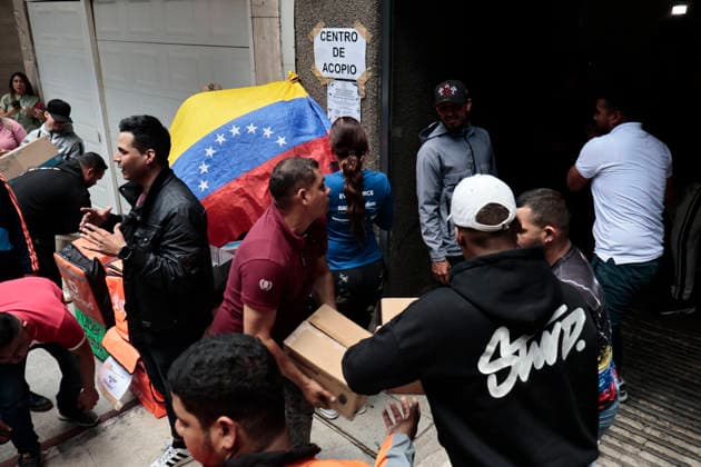 June 26, 2026, Mexico City, Cdmx, Mexico: In response to earthquakes that have caused material losses and casualties in Venezuela, the country s embassy in Mexico City opened its doors as a collection center. It is accepting humanitarian aid brought by Mexicans, foreign nationals, and Venezuelans living in Mexico to provide support during this time. On the first day of accepting itemsâ€including medicines, non-perishable food, water, and hygiene productsâ€dozens of Venezuelans working as app-based delivery drivers arrived at the embassy. Carrying flags and singing their national anthem, they brought supplies needed by their relatives and fellow citizens. Many stated that while their people endure this crisis caused by natural di - ZUMAp204 20260626_zip_p204_056 Copyright: xJosuexPerezx