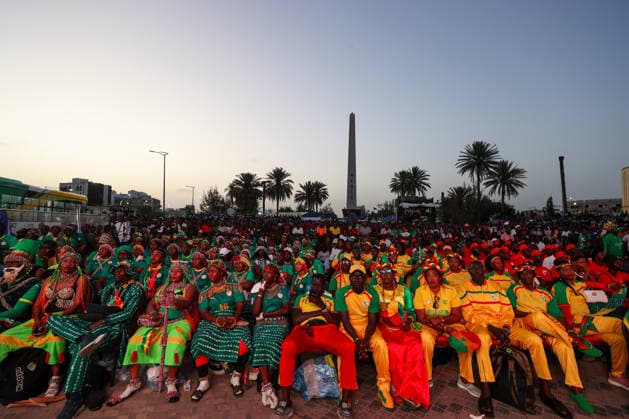 Senegal fans celebrate national team s World Cup victory in Dakar DAKAR, SENEGAL - JUNE 27: A Senegalese fan watches the FIFA World Cup match between Senegal and Iraq on giant screens set up at Place de la Nation, where supporters celebrate Senegal s 5-0 victory over Iraq, in Dakar, Senegal, on June 27, 2026. Cem Ozdel Anadolu Dakar Senegal. Editorial use only. Please get in touch for any other usage.  Copyright: x2026xAnadoluxCemxOzdelx