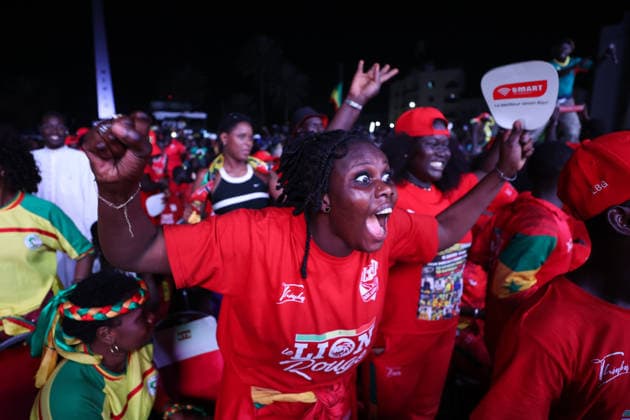 Senegal fans celebrate national team s World Cup victory in Dakar DAKAR, SENEGAL - JUNE 27: Senegalese fans celebrate their national team s 5-0 victory over Iraq in the FIFA World Cup at Place de la Nation in Dakar, Senegal, on June 27, 2026. Hundreds of supporters watch the match on giant screens set up in the square and cheer as Senegal scores each goal. Cem Ozdel Anadolu Dakar Senegal. Editorial use only. Please get in touch for any other usage.  Copyright: x2026xAnadoluxCemxOzdelx