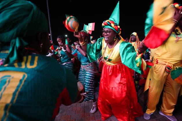 Senegal fans celebrate national team s World Cup victory in Dakar DAKAR, SENEGAL - JUNE 27: Senegalese fans celebrate their national team s 5-0 victory over Iraq in the FIFA World Cup at Place de la Nation in Dakar, Senegal, on June 27, 2026. Hundreds of supporters watch the match on giant screens set up in the square and cheer as Senegal scores each goal. Cem Ozdel Anadolu Dakar Senegal. Editorial use only. Please get in touch for any other usage.  Copyright: x2026xAnadoluxCemxOzdelx