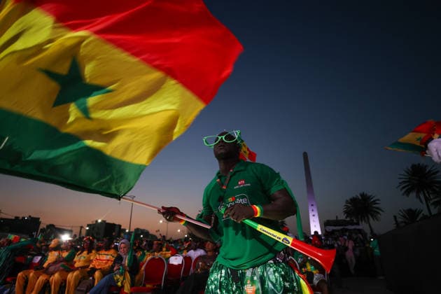 Senegal fans celebrate national team s World Cup victory in Dakar DAKAR, SENEGAL - JUNE 27: Senegalese fans celebrate their national team s 5-0 victory over Iraq in the FIFA World Cup at Place de la Nation in Dakar, Senegal, on June 27, 2026. Hundreds of supporters watch the match on giant screens set up in the square and cheer as Senegal scores each goal. Cem Ozdel Anadolu Dakar Senegal. Editorial use only. Please get in touch for any other usage.  Copyright: x2026xAnadoluxCemxOzdelx