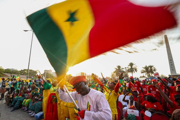 News Bilder des Tages Senegal fans celebrate national team s World Cup victory in Dakar DAKAR, SENEGAL - JUNE 27: A Senegalese fan watches the FIFA World Cup match between Senegal and Iraq on giant screens set up at Place de la Nation, where supporters celebrate Senegal s 5-0 victory over Iraq, in Dakar, Senegal, on June 27, 2026. Cem Ozdel Anadolu Dakar Senegal. Editorial use only. Please get in touch for any other usage.  Copyright: x2026xAnadoluxCemxOzdelx